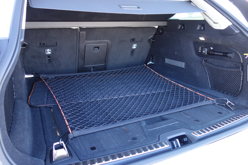 Illustration for article titled The Volvo V90 Cross Country Has Orange Seatbelts and a $3,300 Cargo Box and I Love It